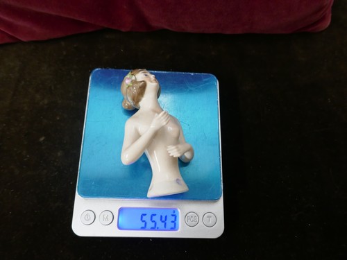 Poupée de porcelaine - 1/2,